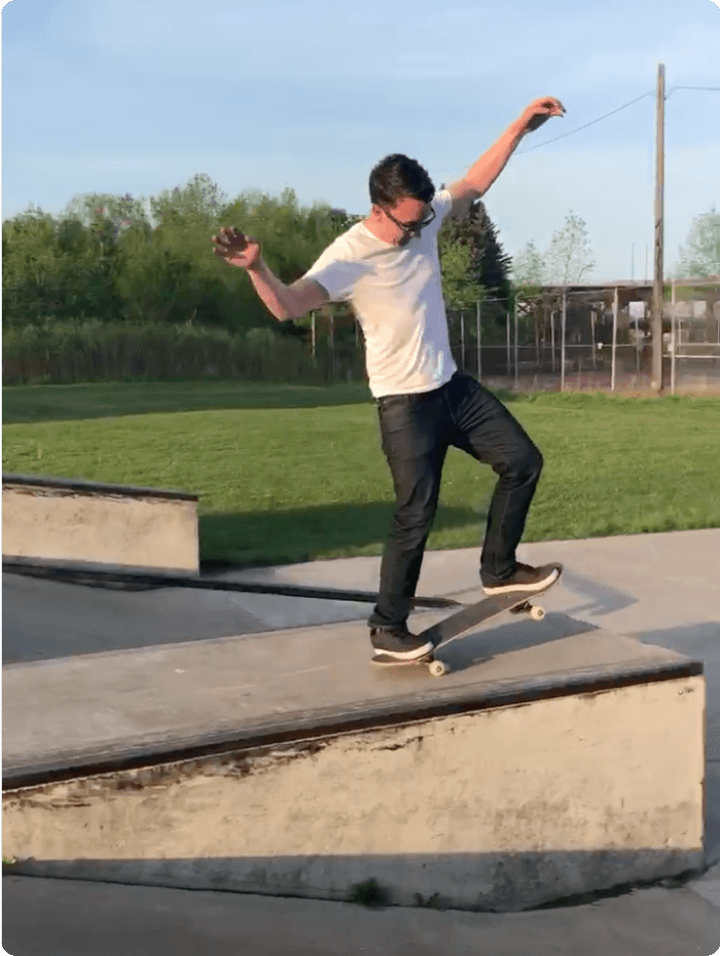 Me doing a manual off a ledge at an outdoor skatepark